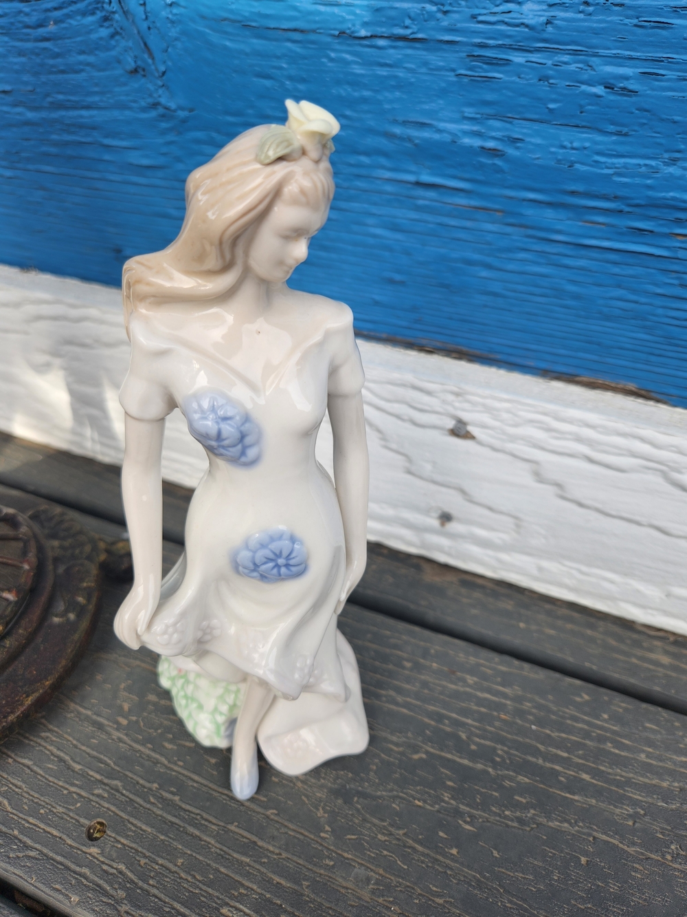 Porcelain Lady Figurine with Blue Floral Accents
